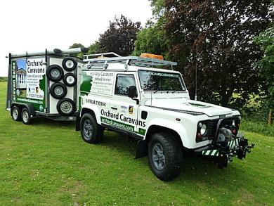 Photo Land rover and trailer used by the siting team at Orchard Caravans