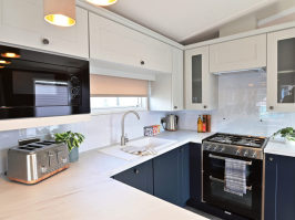 Picture of the dining area in a 2024 40 x 13 2 bedroom Willerby Sheraton sited on the Orchard Holiday Park, Wells next the Sea, North Norfolk.