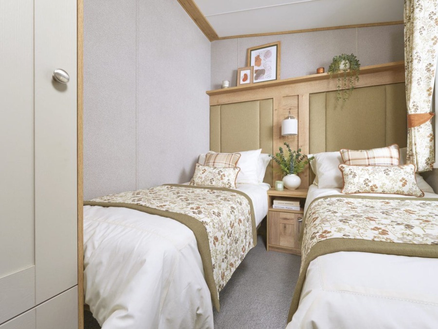 Picture of the twin bedroom in a ABI Ambleside 40 x 14 2 bedroom Static Caravan Holiday Home sited at the Orchard Holiday Park, Wells next the Sea, North Norfolk.