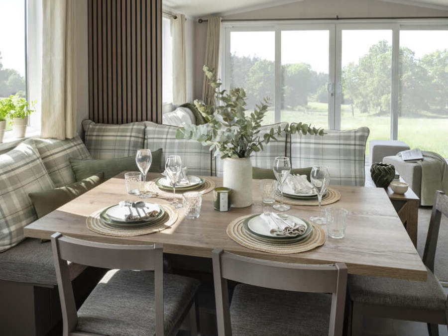 Picture of the dining area in an Swift Morlaix 40 x 14 2 bedroom Static Caravan Holiday Home sited at the Orchard Holiday Park, Wells next the Sea, North Norfolk.