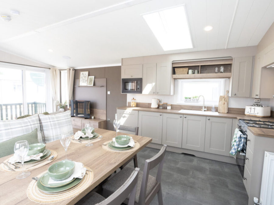 Picture of the long view from the kitchen in a Swift Morlaix 40 x 14 2 bedroom Static Caravan Holiday Home sited at the Orchard Holiday Park, Wells next the Sea, North Norfolk.