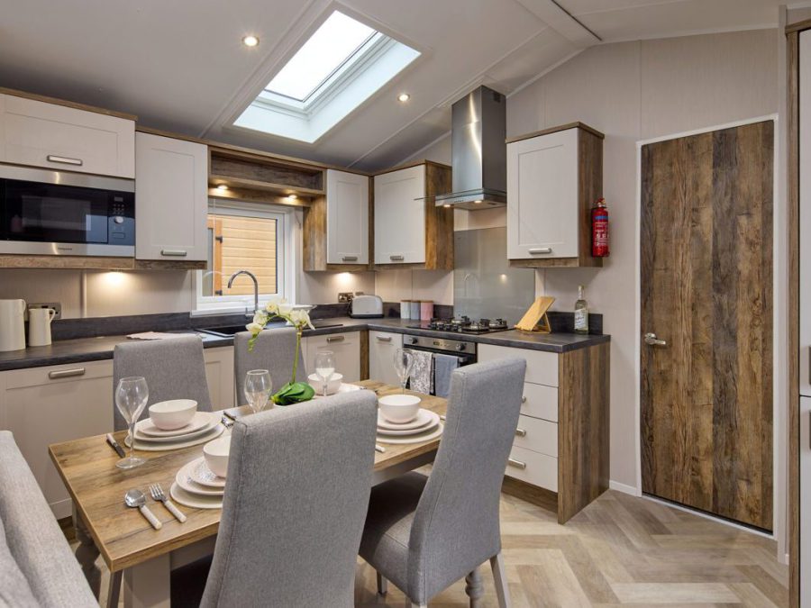Picture of the kitchen/dining area in a 2026 42 x 14 2 bedroom Willerby Sheraton Elite sited on the Orchard Holiday Park, Wells next the Sea, North Norfolk.