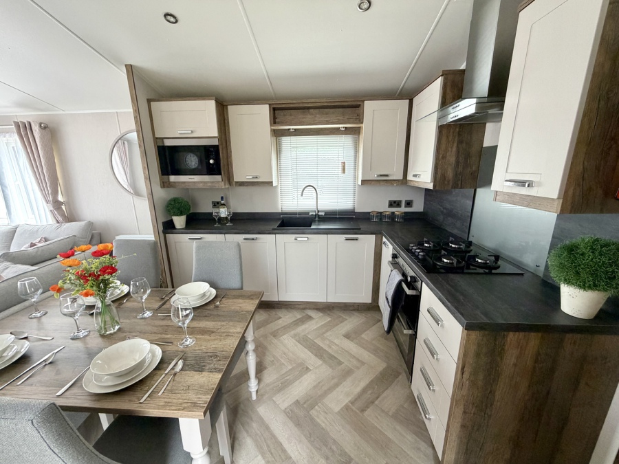 Picture of the kitchen and dining area in a Willerby Sheraton 40 x 13 2 bedroom model Static holiday caravan.
