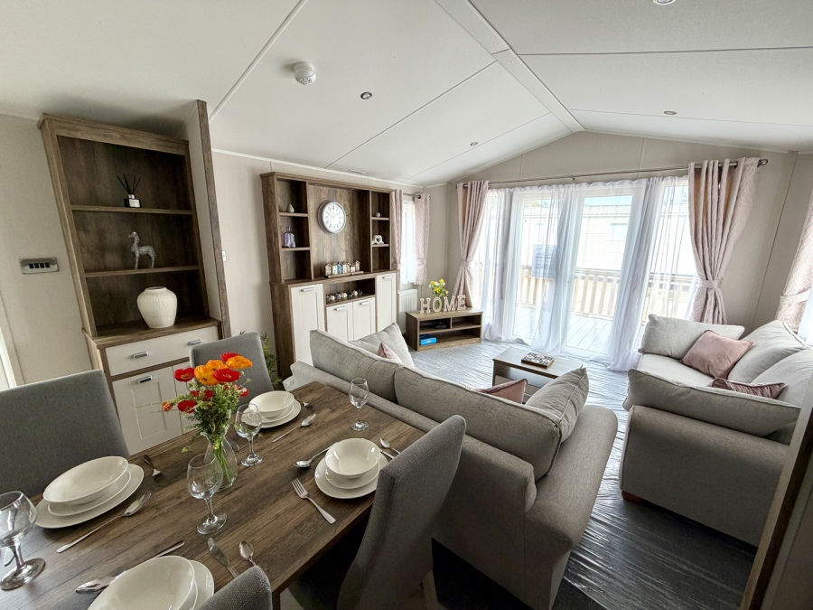 Picture of the view from the kitchen looking forward in a Willerby Sheraton 40 x 13 2 bedroom model Static holiday caravan.