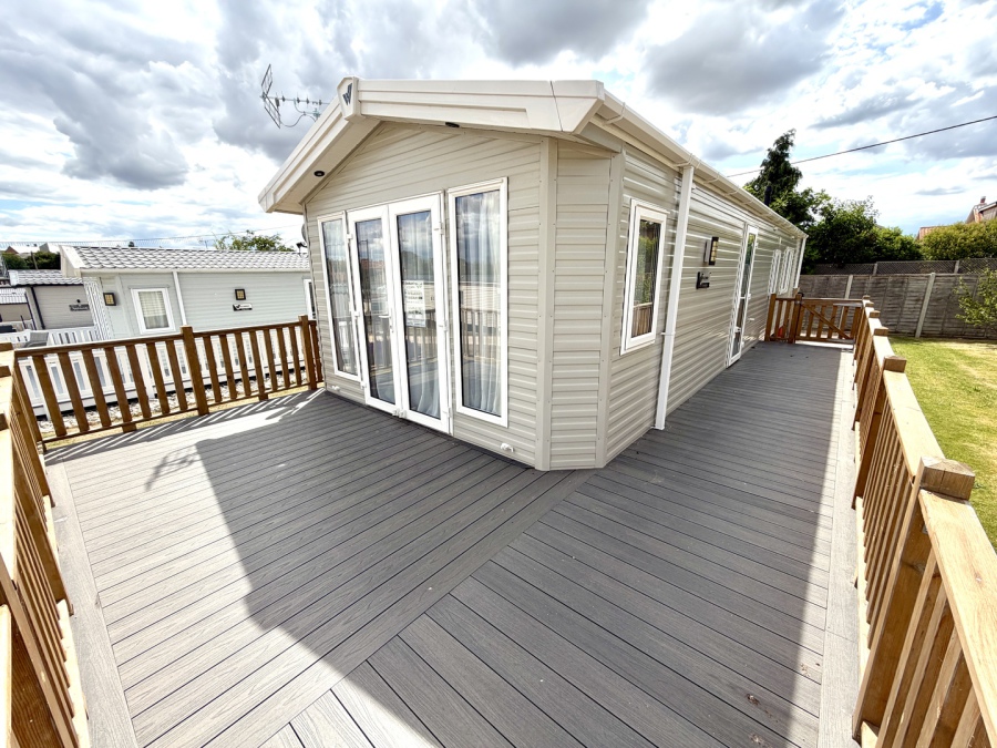 View from the decking looking towards the front of a Willerby Sheraton 40 x 13 2 bedroom model Static holiday caravan.