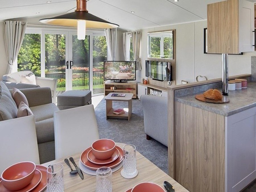 Picture of the kitchen and dining area in a Willerby Manor 38 x 12 2 bedroom Static Caravan Holiday Home, sited at The Orchard Holiday Park, Wells next the Sea, North Norfolk.