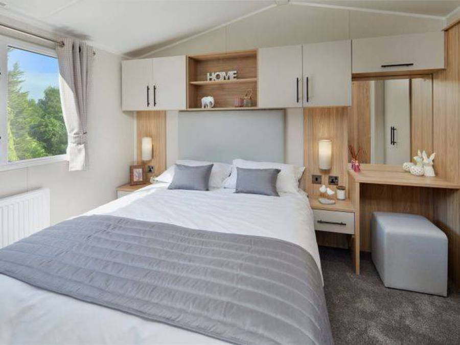 Picture of the master bedroom in a Willerby Manor 38 x 12 2 bedroom Static Caravan Holiday Home, sited at The Orchard Holiday Park, Wells next the Sea, North Norfolk.