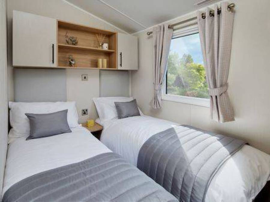 Picture of the twin bedroom in a Willerby Manor 38 x 12 2 bedroom Static Caravan Holiday Home, sited at The Orchard Holiday Park, Wells next the Sea, North Norfolk.